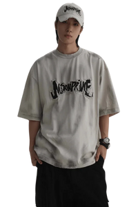 Masonprince Vintage Patch Tee in light gray with black logo print worn by model with cap and watch