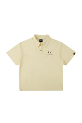 DangerousPeople DSP｜Textured Small‑Eye Graphic Boxy Fit Couple Short‑Sleeve Polo Shirt