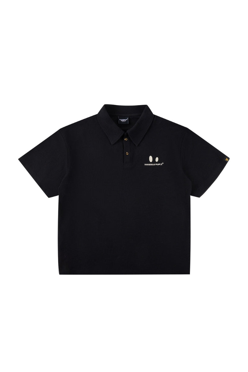 DangerousPeople DSP｜Textured Small‑Eye Graphic Boxy Fit Couple Short‑Sleeve Polo Shirt