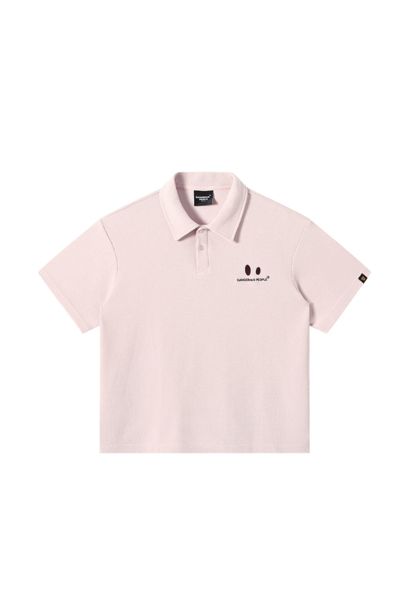 DangerousPeople DSP｜Textured Small‑Eye Graphic Boxy Fit Couple Short‑Sleeve Polo Shirt