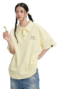 DangerousPeople DSP｜Textured Small‑Eye Graphic Boxy Fit Couple Short‑Sleeve Polo Shirt