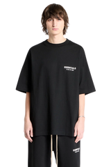 เสื้อยืดลายโลโก้ Arch SS24 ของ Fear Of God Essentials