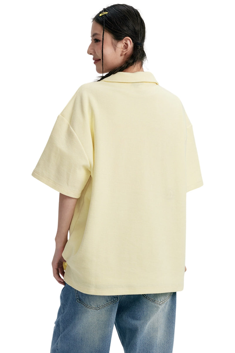 DangerousPeople DSP｜Textured Small‑Eye Graphic Boxy Fit Couple Short‑Sleeve Polo Shirt