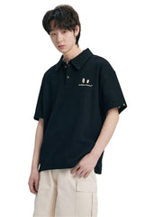 DangerousPeople DSP｜Textured Small‑Eye Graphic Boxy Fit Couple Short‑Sleeve Polo Shirt