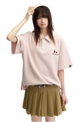 DangerousPeople DSP｜Textured Small‑Eye Graphic Boxy Fit Couple Short‑Sleeve Polo Shirt