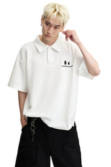 DangerousPeople DSP｜Textured Small‑Eye Graphic Boxy Fit Couple Short‑Sleeve Polo Shirt
