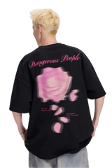 Men's Dangerous People blurred rose graphic tee featuring a vibrant pink rose design on a black background