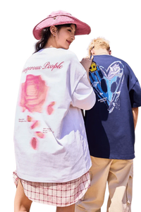 Casual loosely fitted blurred rose graphic tee by Dangerous People, featuring vibrant artwork on the back