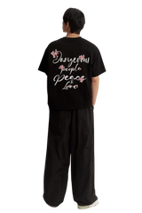 Black Cherry Blossom Tee by Dangerous People with floral designs and stylish text on the back