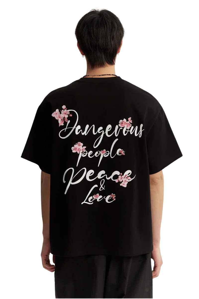 Black Dangerous People Cherry Blossom Tee featuring floral graphics and a stylish back design
