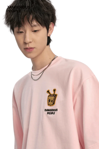 Bee Paper Bag Embroidery Logo Tee in pink by Dangerous People featuring a unique embroidered design