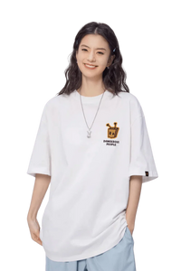 Model wearing a white Bee Paper Bag Embroidery Logo Tee from Dangerous People for a trendy look