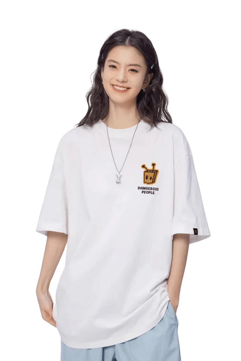 Model wearing a white Bee Paper Bag Embroidery Logo Tee from Dangerous People for a trendy look