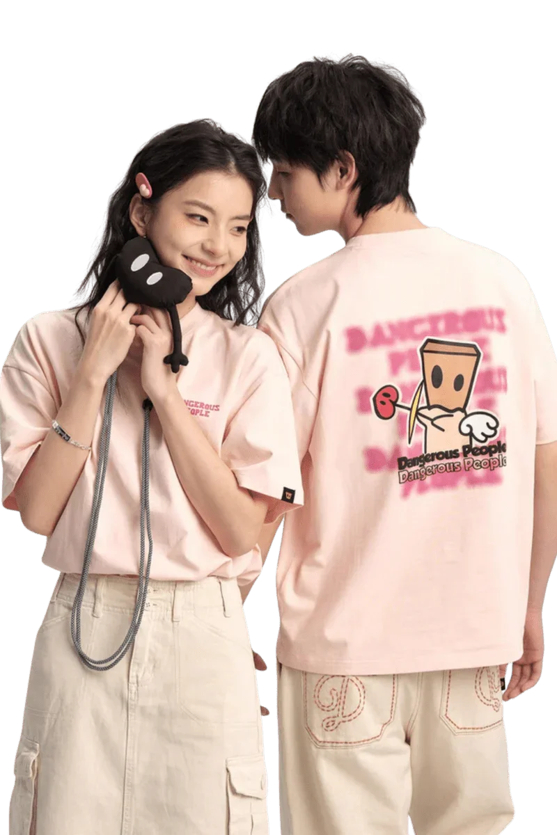 Cupid Love Tee by Dangerous People featuring playful graphic on the back and soft pink fabric