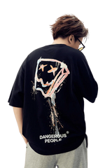 Back view of Dangerous People graphic tee featuring colorful artwork and brand logo on a black shirt