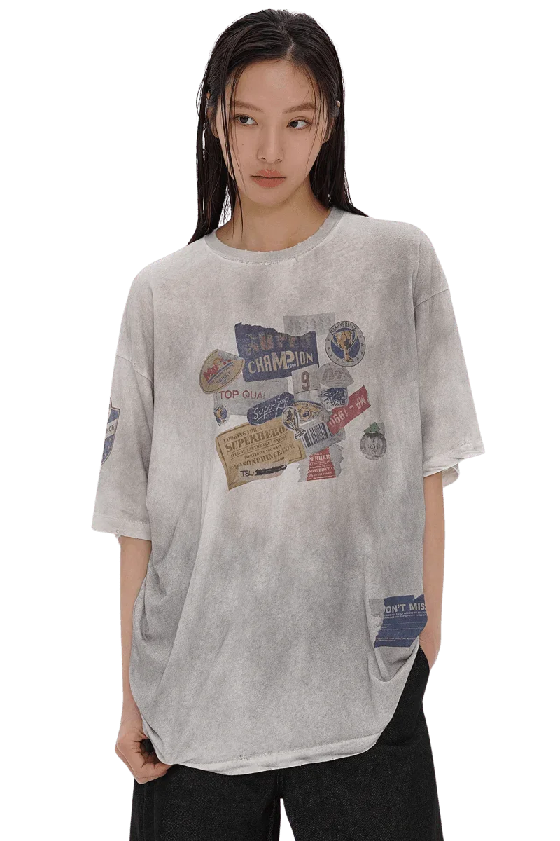 Masonprince Dirty 150GSM Tee in light gray with vintage graphic patches worn by model