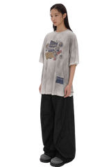 Masonprince Dirty 150GSM Tee worn by a model with graphic print and relaxed fit in gray
