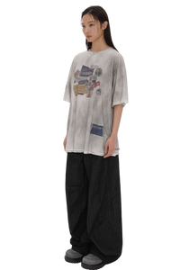 Masonprince Dirty 150GSM Tee worn by a model with graphic print and relaxed fit in gray
