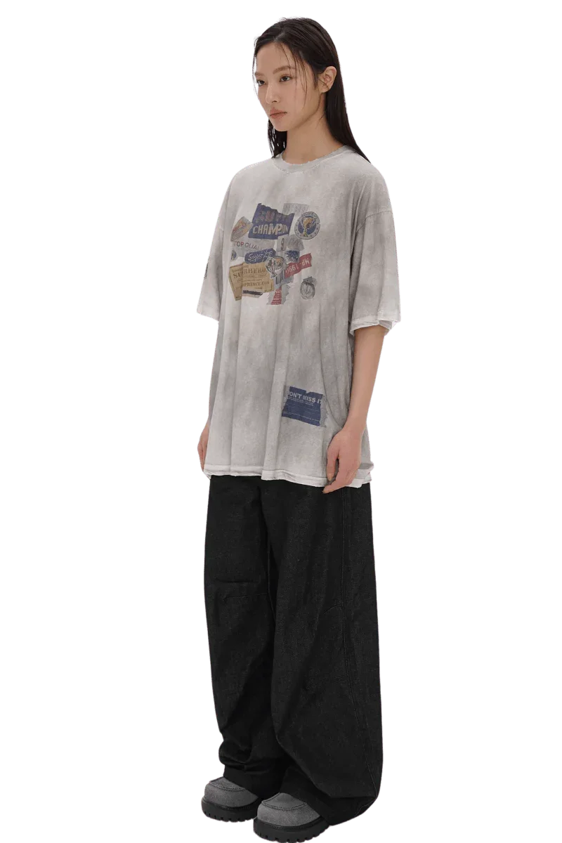 Masonprince Dirty 150GSM Tee worn by a model with graphic print and relaxed fit in gray