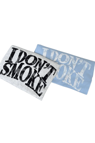 IDontSmoke Sorona material graphic tee folded in light gray with bold black text on black background