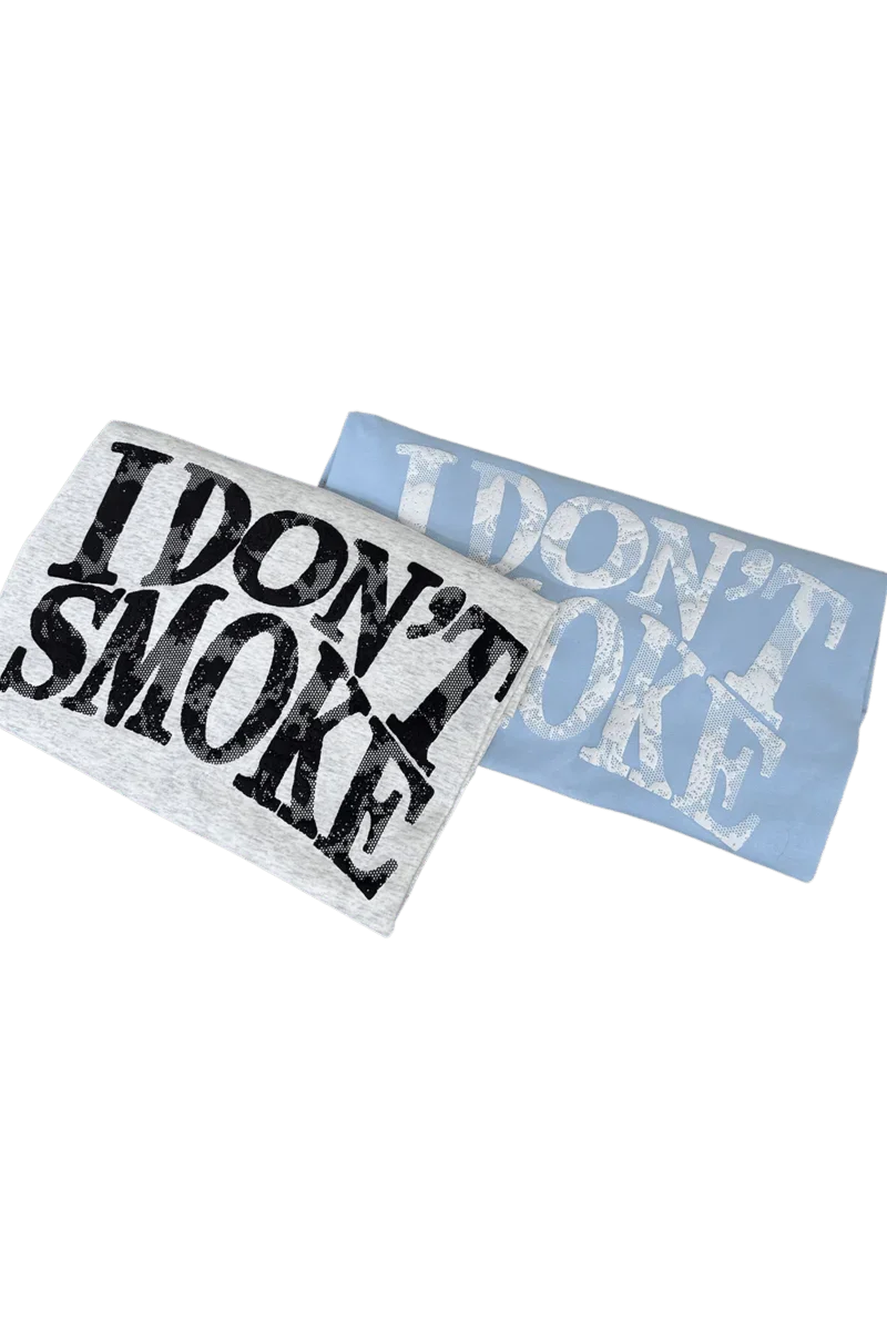 IDontSmoke Sorona material graphic tee folded in light gray with bold black text on black background