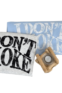 IDontSmoke Sorona material graphic tee in light blue and gray with bold distressed logo design