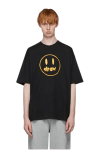 Drew House Painted Mascot Tee in black with yellow smiley logo for casual fashion.