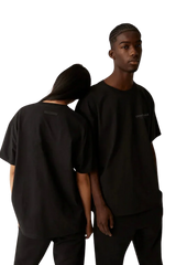 Fear Of God Essentials FW21 Core Collection Tee Black Reflective worn by models showcasing modern style