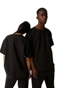Fear Of God Essentials FW21 Core Collection Tee Black Reflective worn by models showcasing modern style