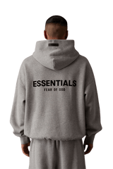 SS22 Flocked Logo Hoodie in grey featuring Essentials and Fear of God branding on the back