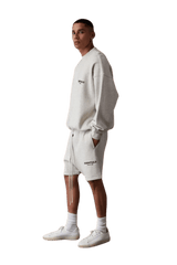 Men's ShaLaoBan SS22 Flocked Logo Shorts in gray paired with a matching sweatshirt