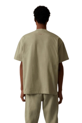 ShaLaoBan SS22 Tee in beige, featuring a relaxed fit and minimalist design, showcased from the back