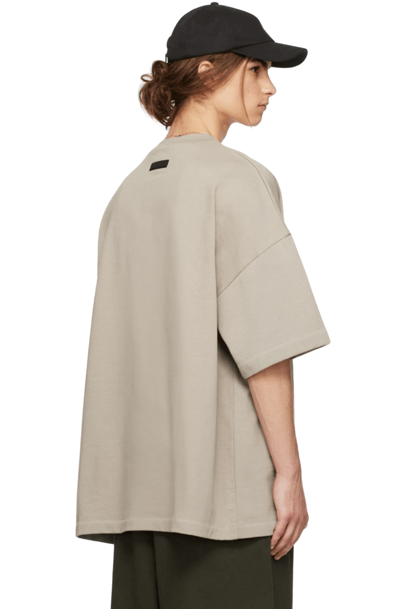 Fear Of God Essentials SS24 Heavy Jersey Arch Logo Tee in beige with a relaxed fit