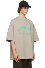 Fear Of God Essentials SS24 Heavy Jersey Arch Logo Tee in light gray with bold logo design