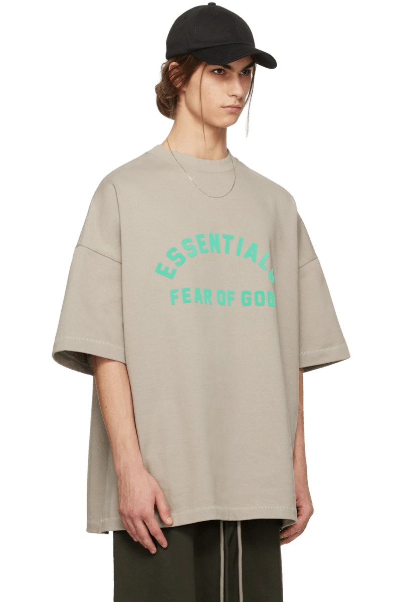 Fear Of God Essentials SS24 Heavy Jersey Arch Logo Tee in light gray with bold logo design