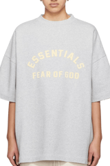 Fear Of God Essentials SS24 Heavy Jersey Arch Logo Tee in light gray with oversized fit and bold logo