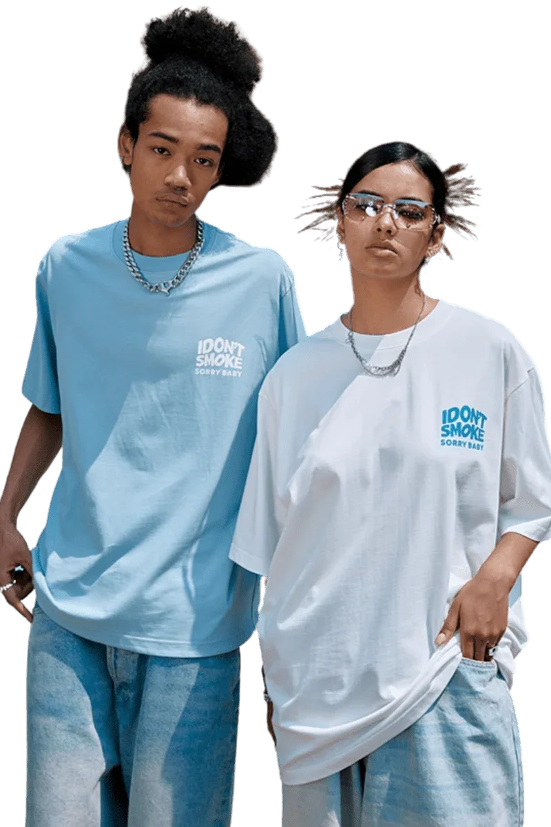 Two models wearing IDontSmoke Basic Small Logo Tee in light blue and white with casual denim jeans
