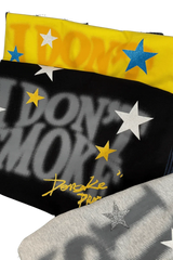 IDontSmoke Sorona t-shirt collection in yellow black and gray with star patterns and bold logo print