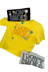 IDontSmoke Sorona t-shirt in bright yellow with logo print and additional gray folded tee with star designs