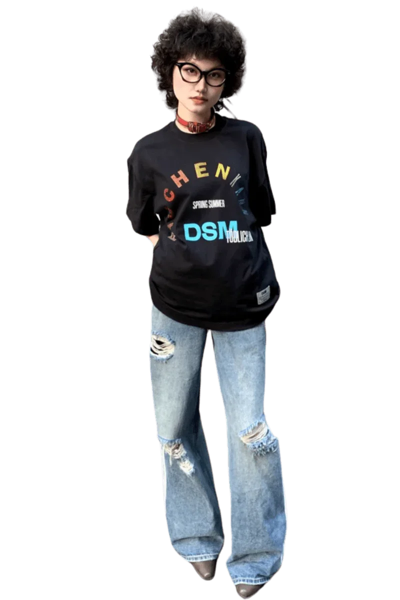 IDontSmoke SS25 Arch Logo Rhinestone Tee black short sleeve shirt with colorful print worn with ripped jeans