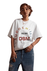 IDontSmoke SS25 Arch Logo Rhinestone Tee white oversized shirt with colorful arch print worn with blue jeans