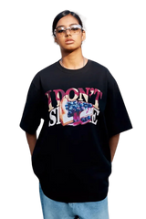 Black IDontSmoke Street Picnic Series Tee featuring colorful graphic design worn by model with sunglasses