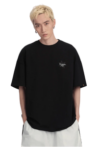Black Maple Leaf Embroidery Tee from Dangerous People with a relaxed fit and unique design