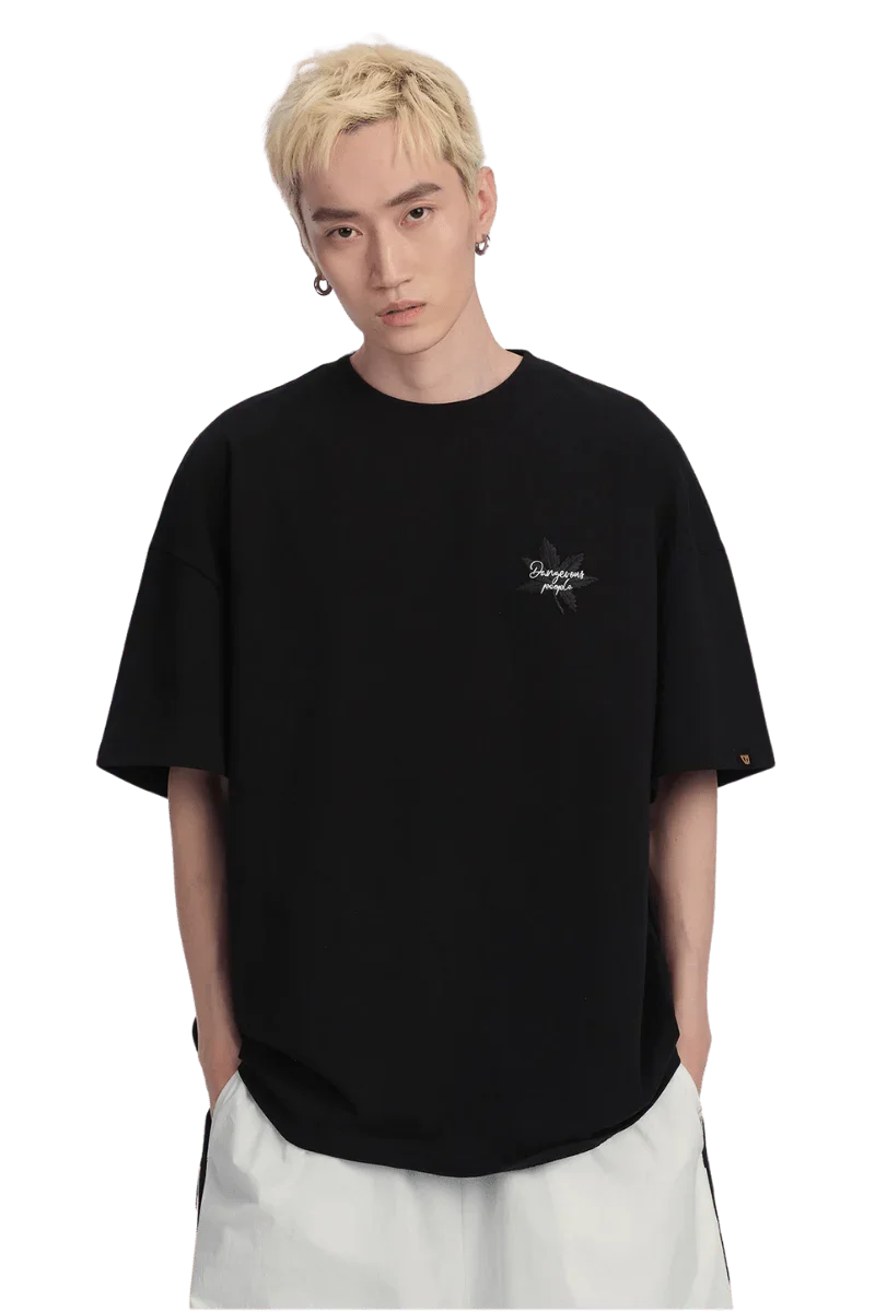 Black Maple Leaf Embroidery Tee from Dangerous People with a relaxed fit and unique design