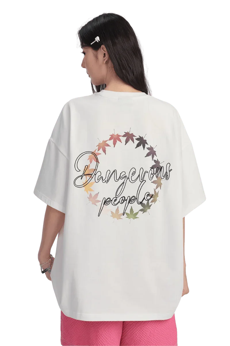 White Maple Leaf Embroidery Tee by Dangerous People featuring a colorful leaf design on the back