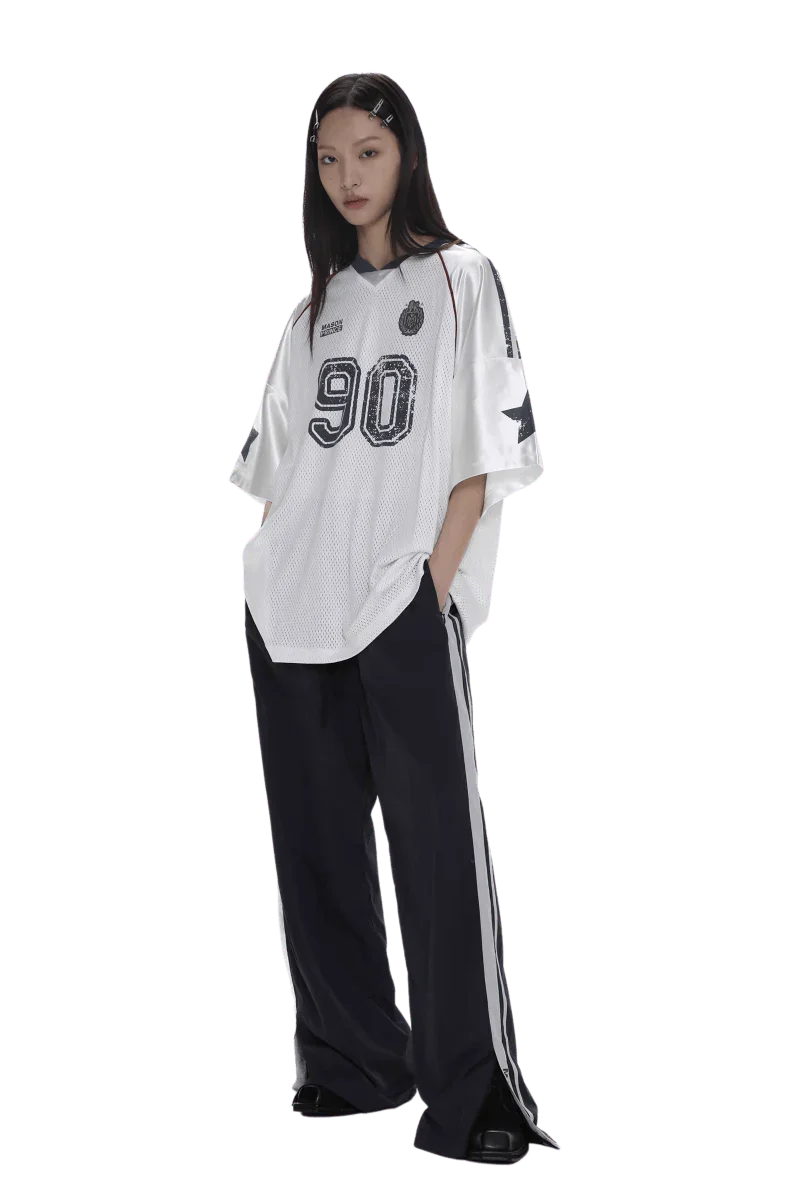 Masonprince 90s star mesh tee white oversized shirt with black numbers worn by model with black pants