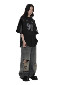 Model wearing Masonprince 90s star mesh tee in black with oversized fit and star details