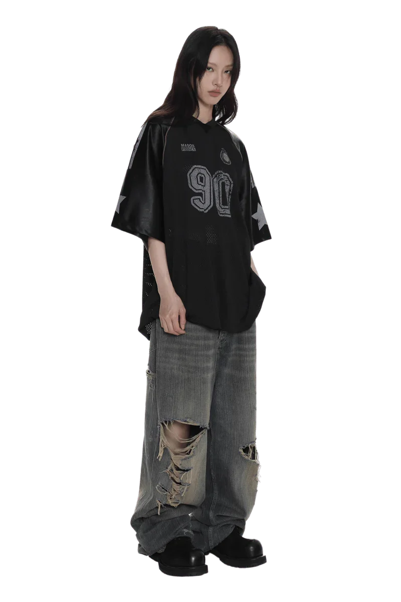 Model wearing Masonprince 90s star mesh tee in black with oversized fit and star details