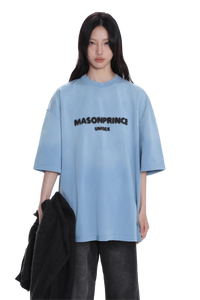 Woman wearing Masonprince 2.0 Faded Logo Gradient Tee in light blue with black gradient text