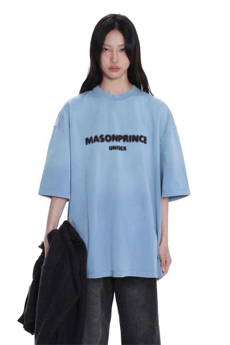 Woman wearing Masonprince 2.0 Faded Logo Gradient Tee in light blue with black gradient text